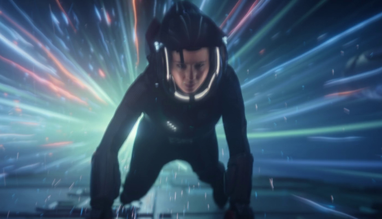 Still frame from Star Trek SNW 4x06 showing La'an in a spacesuit on the hull