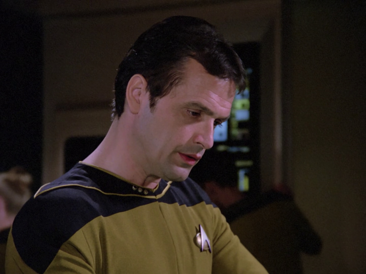 till frame from Star Trek TNG 1x22 showing Leland T Lynch