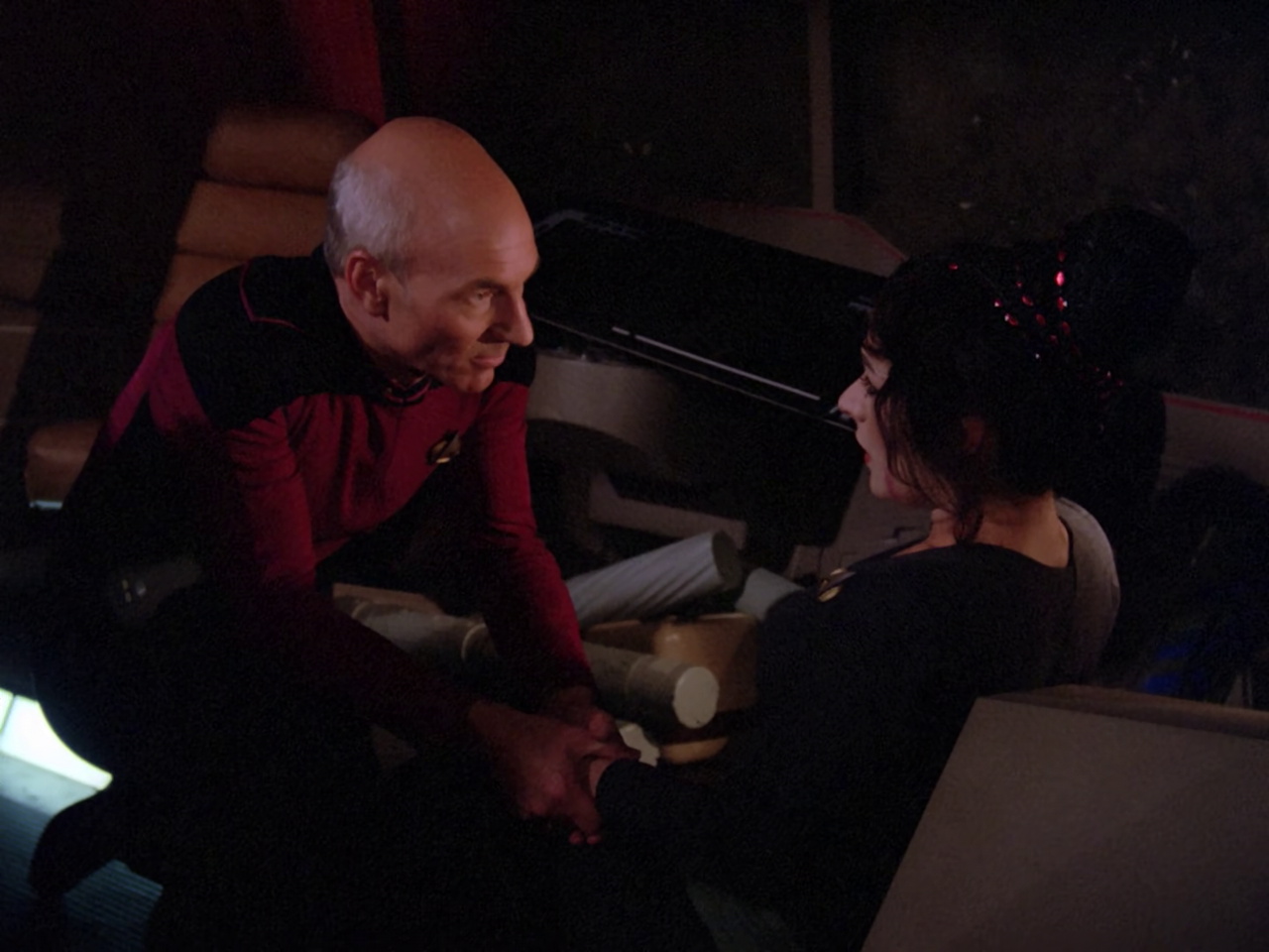 till frame from Star Trek TNG 1x22 showing Picard with Troi in the shuttle