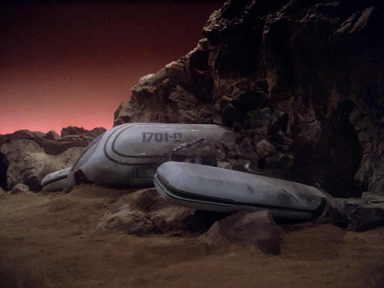 till frame from Star Trek TNG 1x22 showing the wrecked shuttle