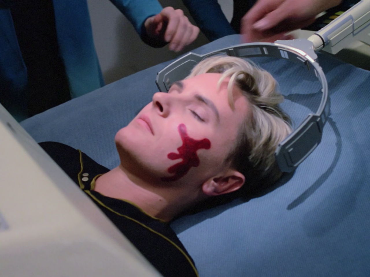 till frame from Star Trek TNG 1x22 showing Tasha on a bio-bed
