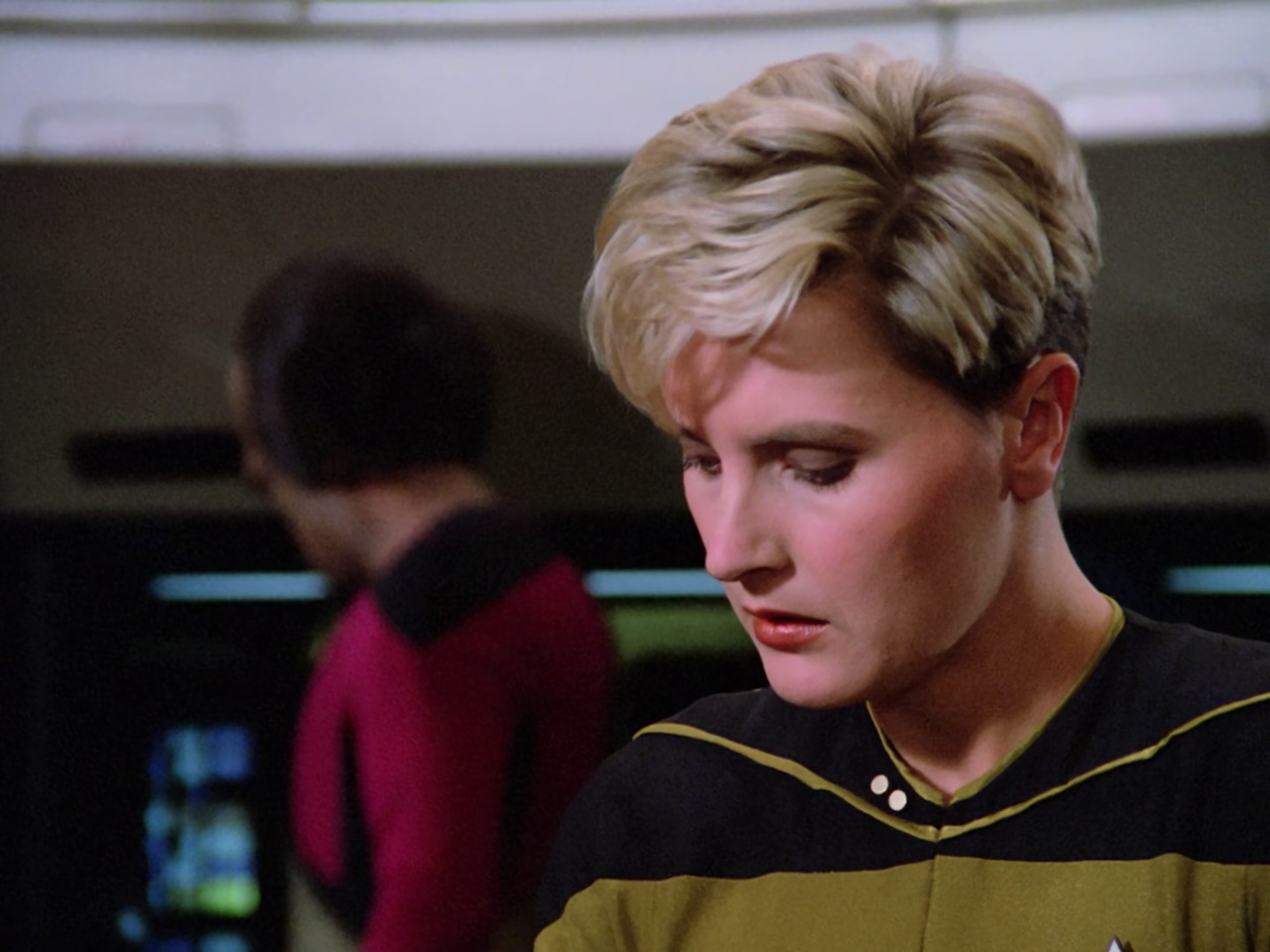 till frame from Star Trek TNG 1x22 showing Tasha on the bridge