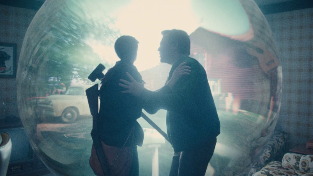 Still frame from The End of Oak Street (2026) showing a wormhole portal