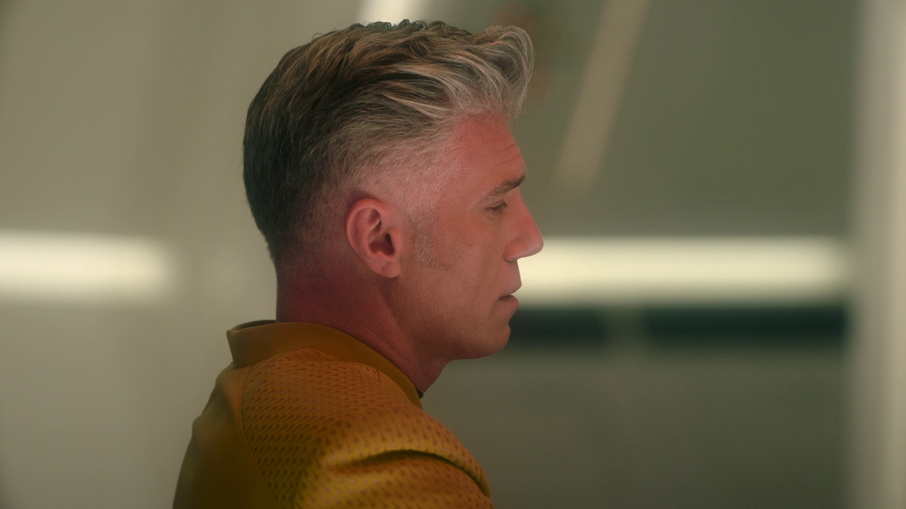Still frame from Star Trek SNW 4x07 showing Pike (side angle)