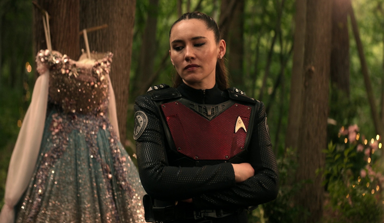 Still frame from Star Trek SNW 4x09 showing La'an sulking