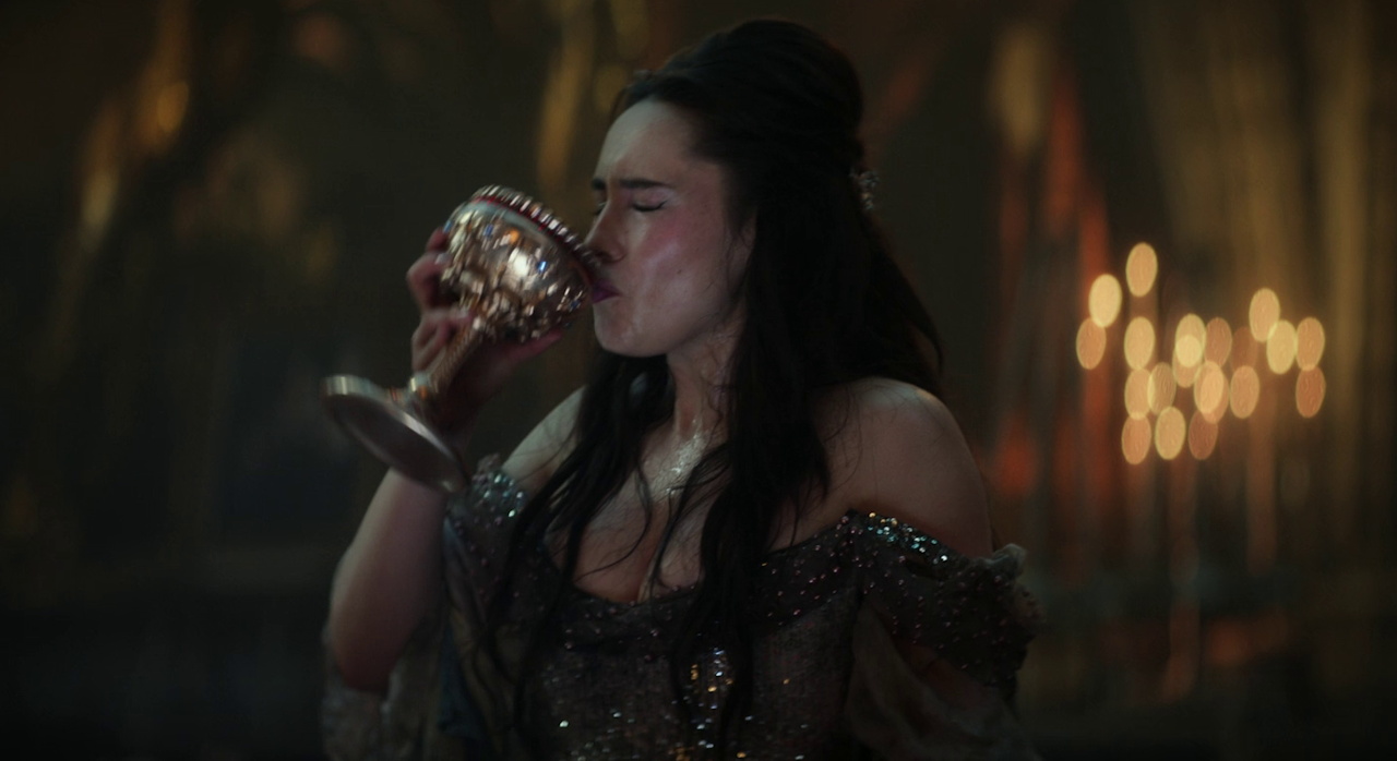 Still frame from Star Trek SNW 4x09 showing Princess La'an drinking from a goblet