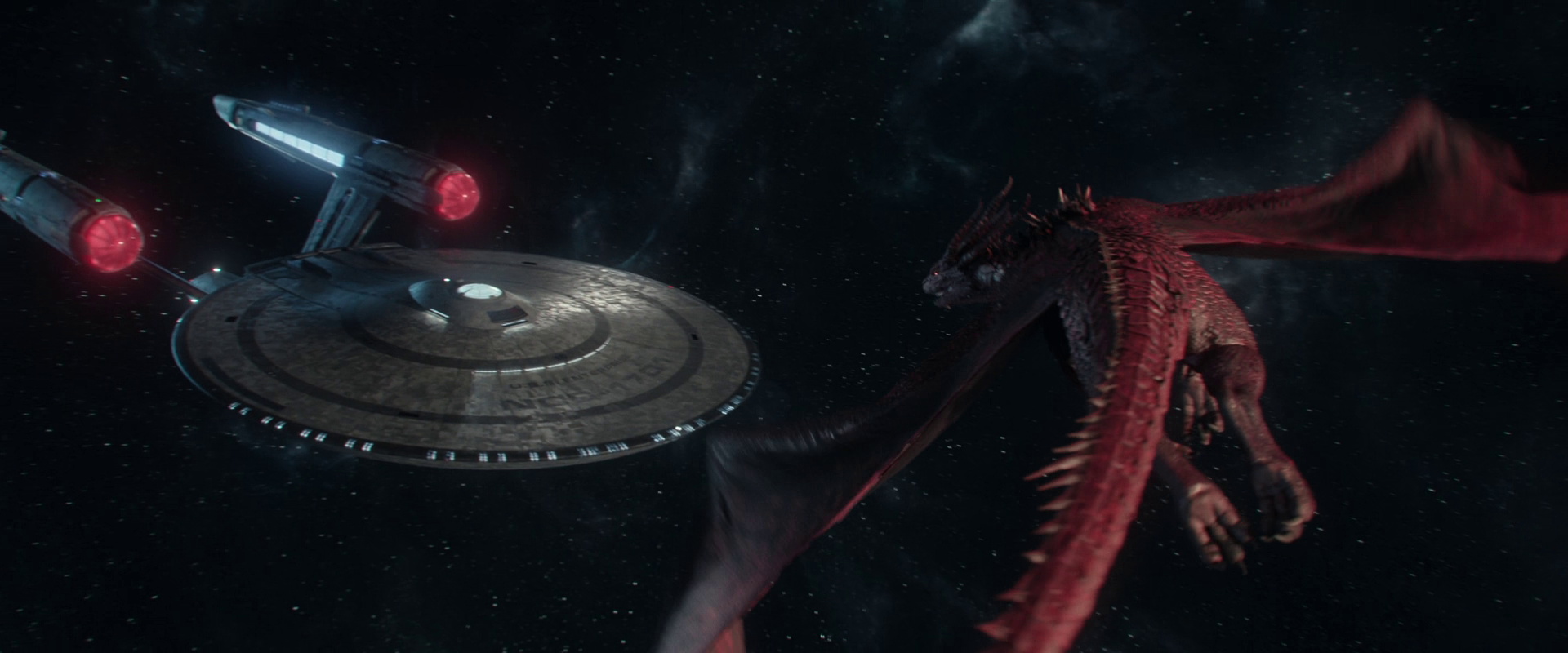 Still frame from Star Trek SNW 4x09 showing the USS Enterprise and a dragon