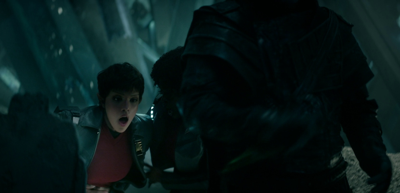 Still frame from Star Trek SNW 4x08 showing A'Sha after being stabbed