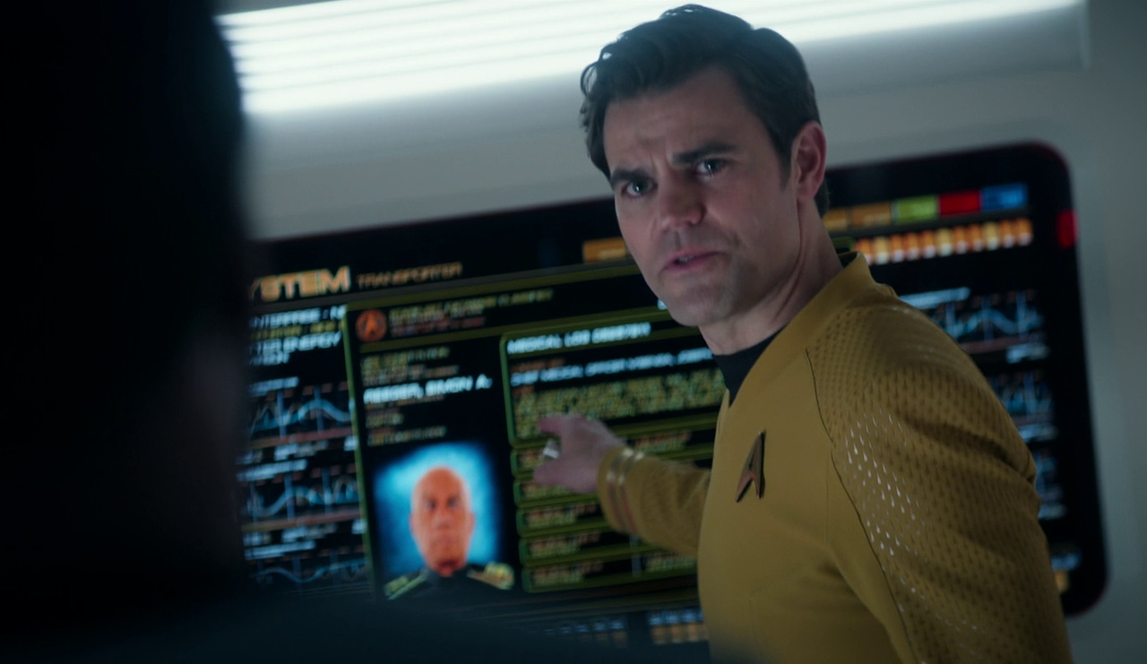 Still frame from Star Trek SNW 4x08 showing Kirk accessing medical records