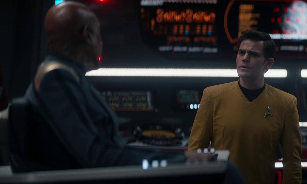 Still frame from Star Trek SNW 4x08 showing Kirk with Reeger on the bridge