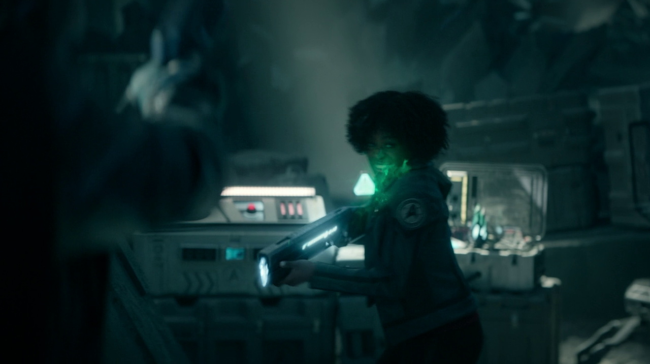 Still frame from Star Trek SNW 4x08 showing Uhura getting shot