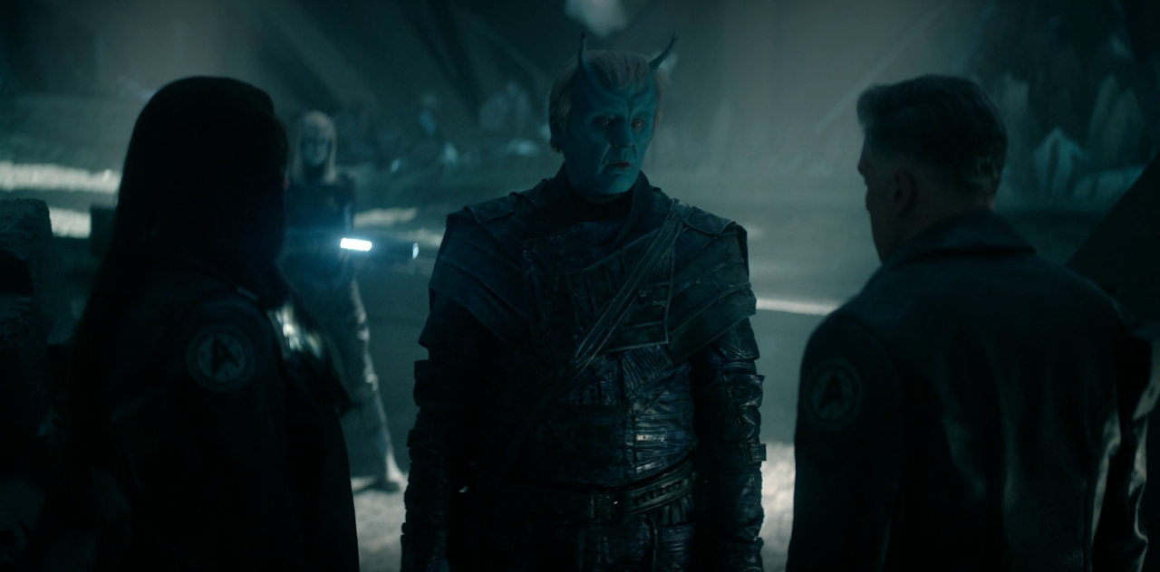 Still frame from Star Trek SNW 4x08 showing Una and Pike with the Andorian leader