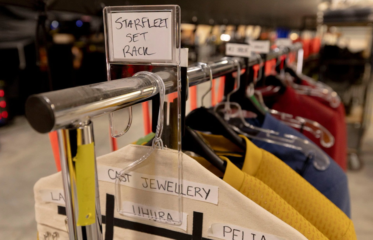 Behind-the-scenes photo from the set of Star Trek SNW S4 showing a costume rack