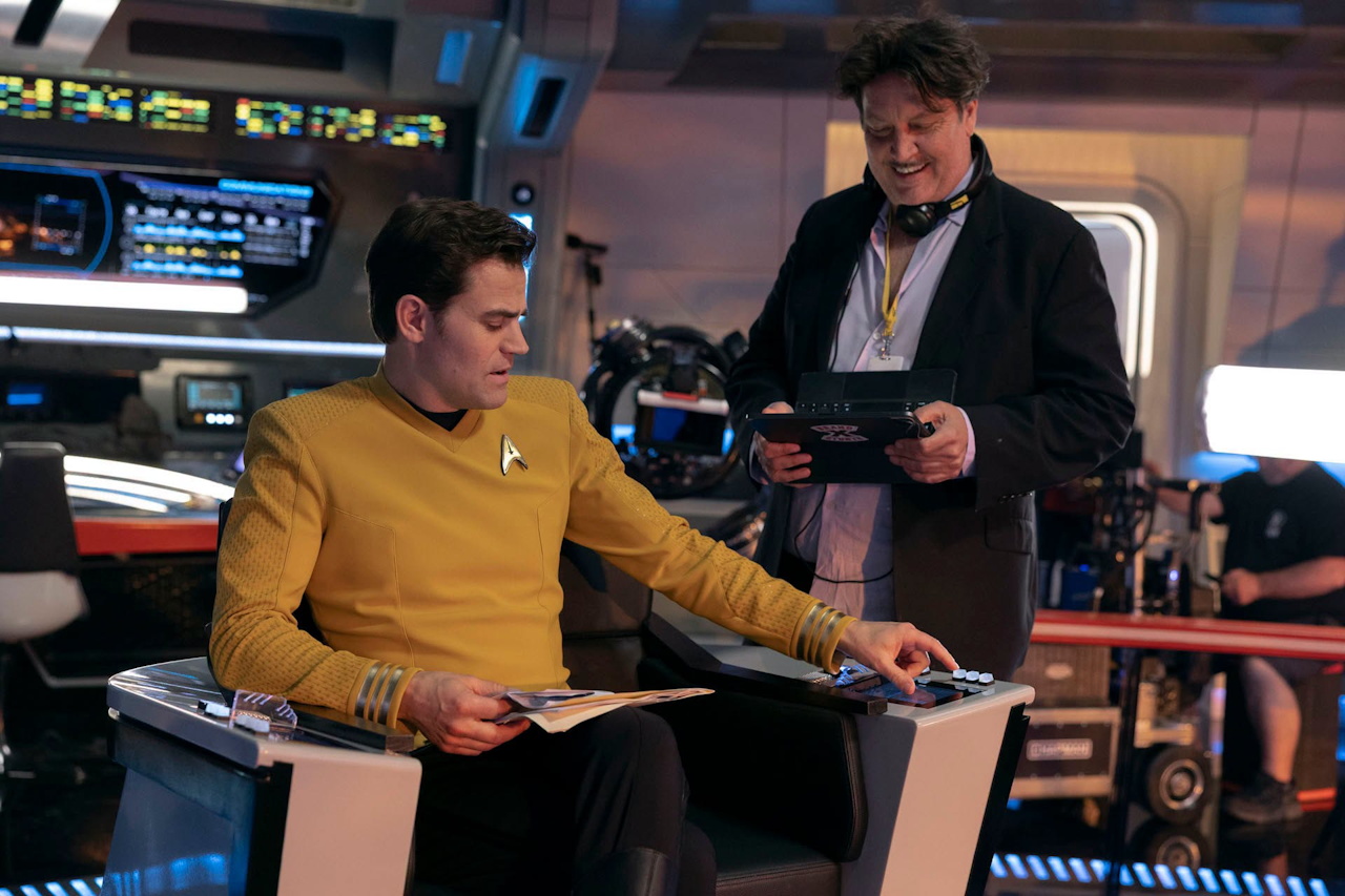 Behind-the-scenes photo from the set of Star Trek SNW S4 showing Wesley and director Christ Fisher