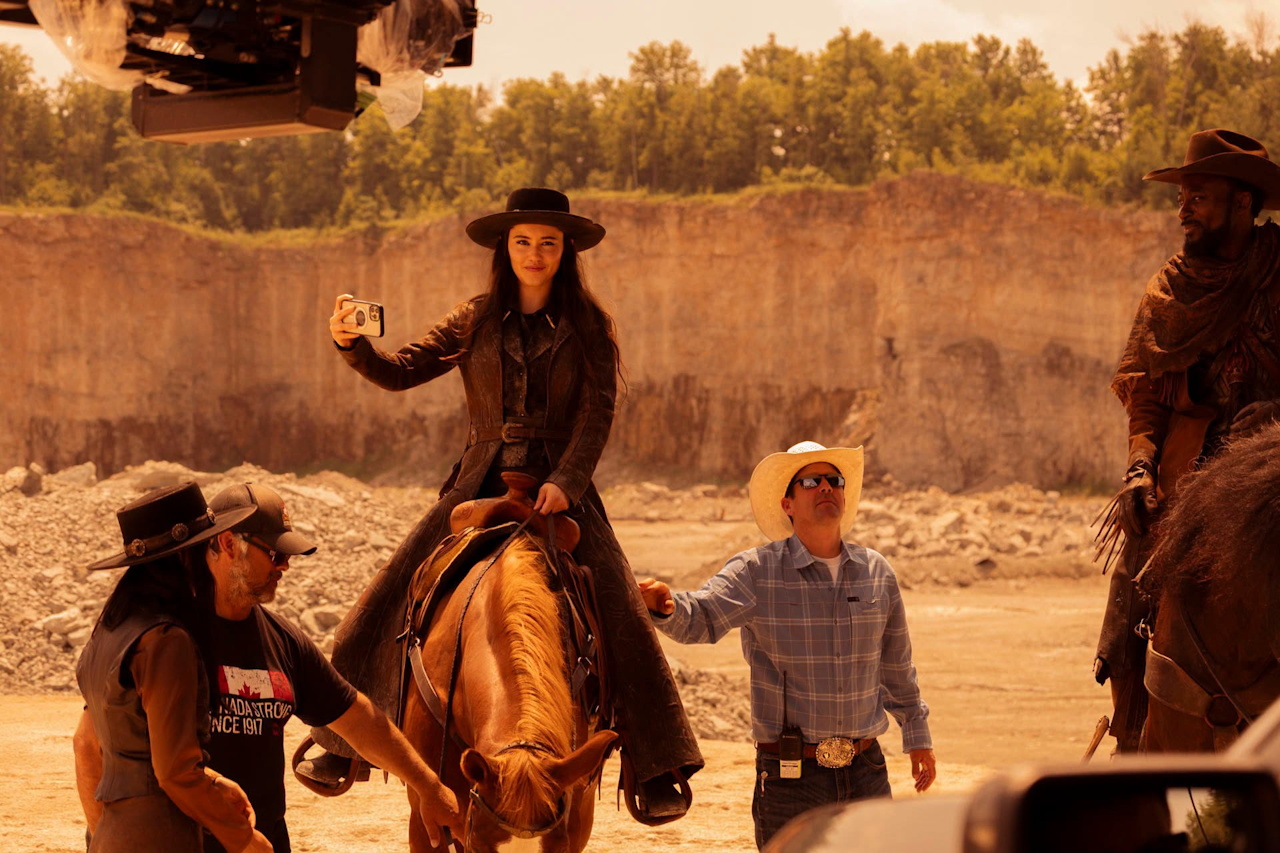 Behind-the-scenes photo from the set of Star Trek SNW S4 showing Christina Chong on a horse