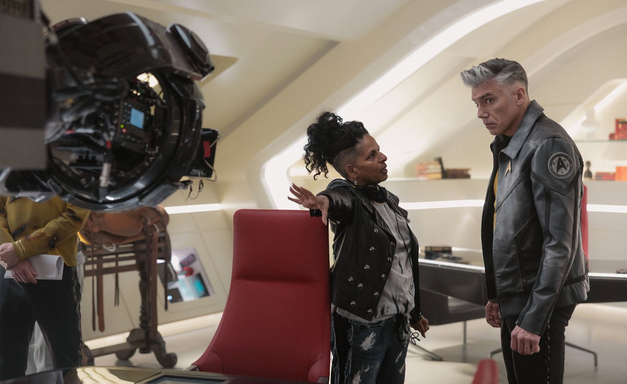 Behind-the-scenes photo from the set of Star Trek SNW S4 showing Anson Mount and director Sharon Lewis