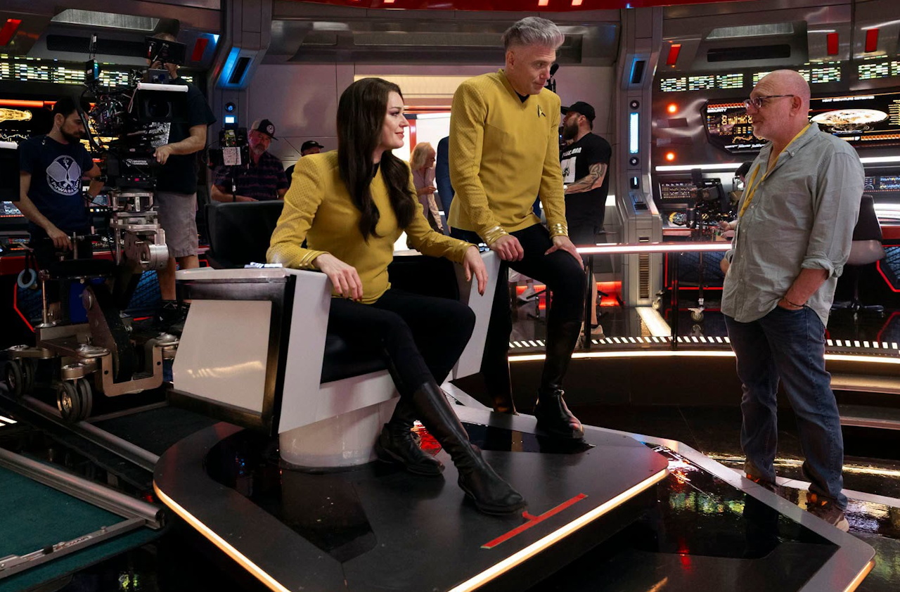Behind-the-scenes photo from the set of Star Trek SNW S4 showing Romijn, Mount, and Goldsman
