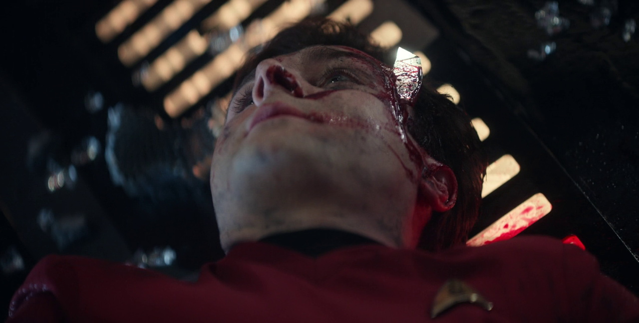 Still frame from Star Trek SNW 4x10 showing Scotty dead