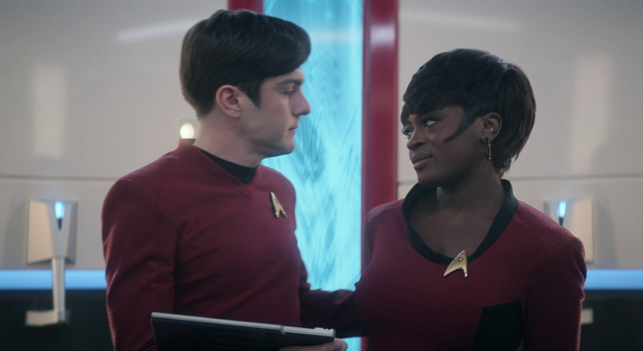 Still frame from Star Trek SNW 4x10 showing Scotty and Uhura in the turbolift