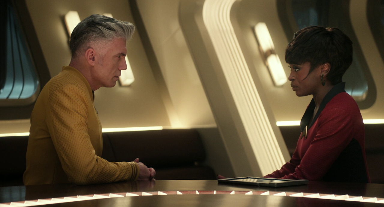 Still frame from Star Trek SNW 4x10 showing Pike and Uhura