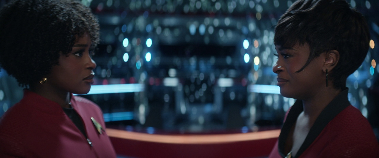 Still frame from Star Trek SNW 4x10 showing two Uhuras