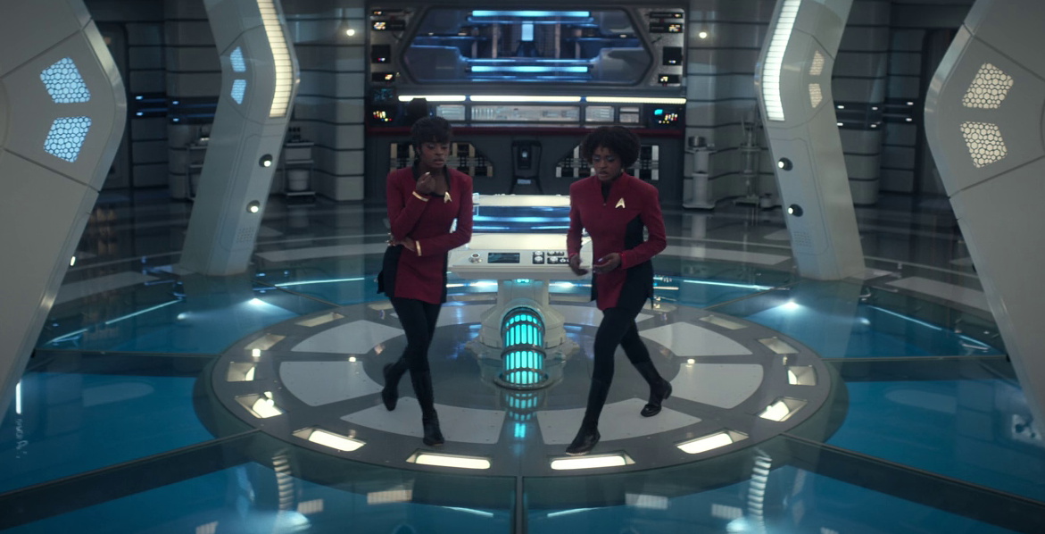 Still frame from Star Trek SNW 4x10 showing two Uhuras