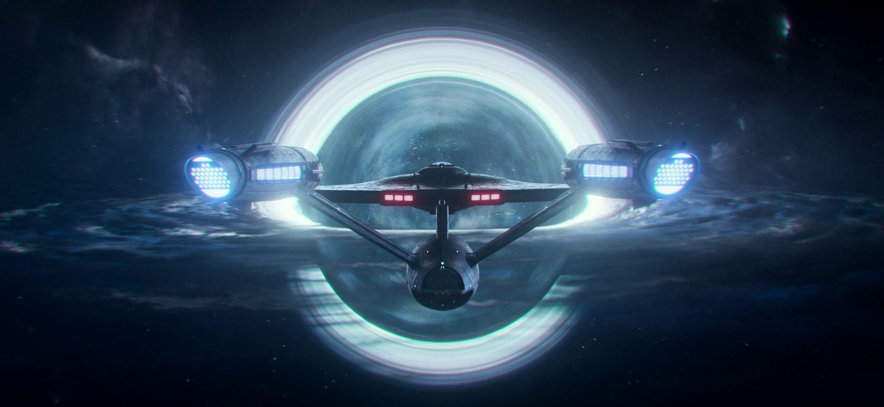 Still frame from Star Trek SNW 4x10 showing the Enterprise and a white hole