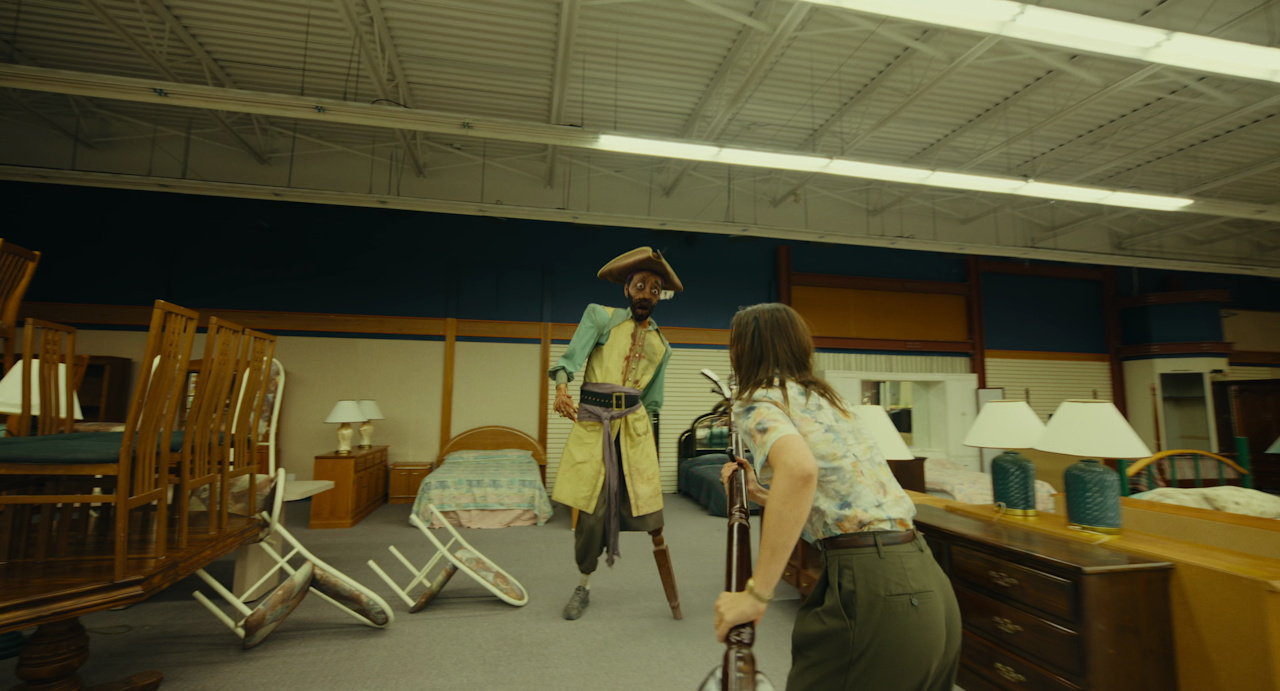 Still frame from Backrooms (2026) showing Mary and Pirate Clark