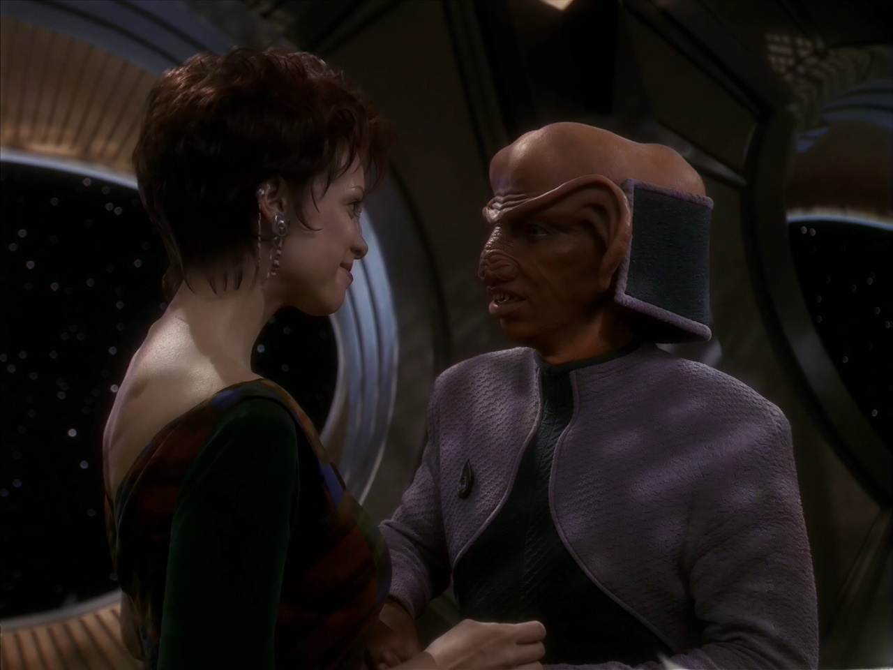 (A.I. upscaled) still frame from Star Trek DS9 5x26 showing Leeta and Rom