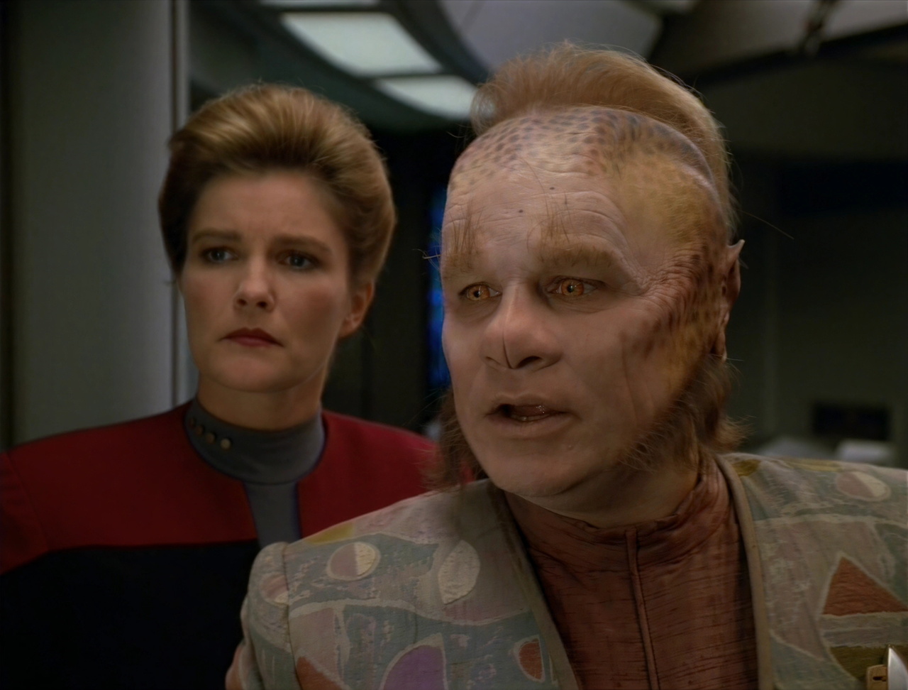 (A.I. upscaled) still frame from Star Trek VOY Investigations showing Neelix and Janeway