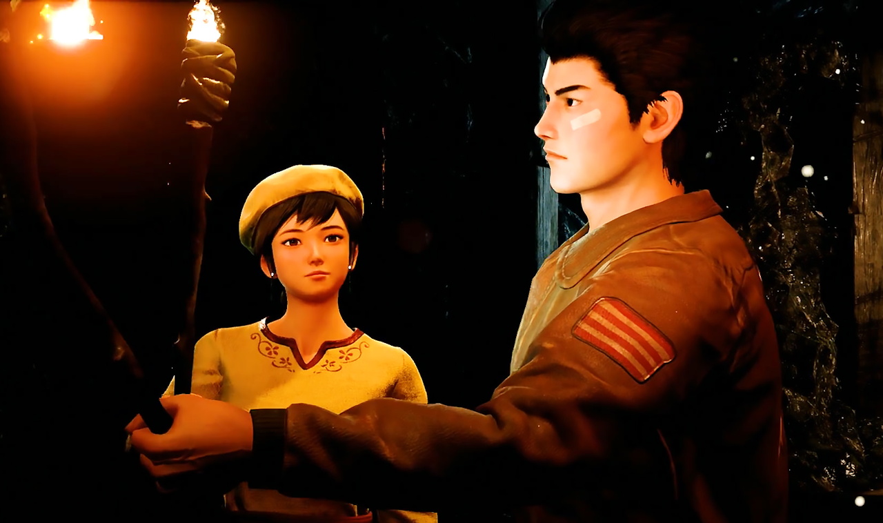 Promo/dev screenshot from Shenmue III showing Shenhua and Ryo in a cave with torches